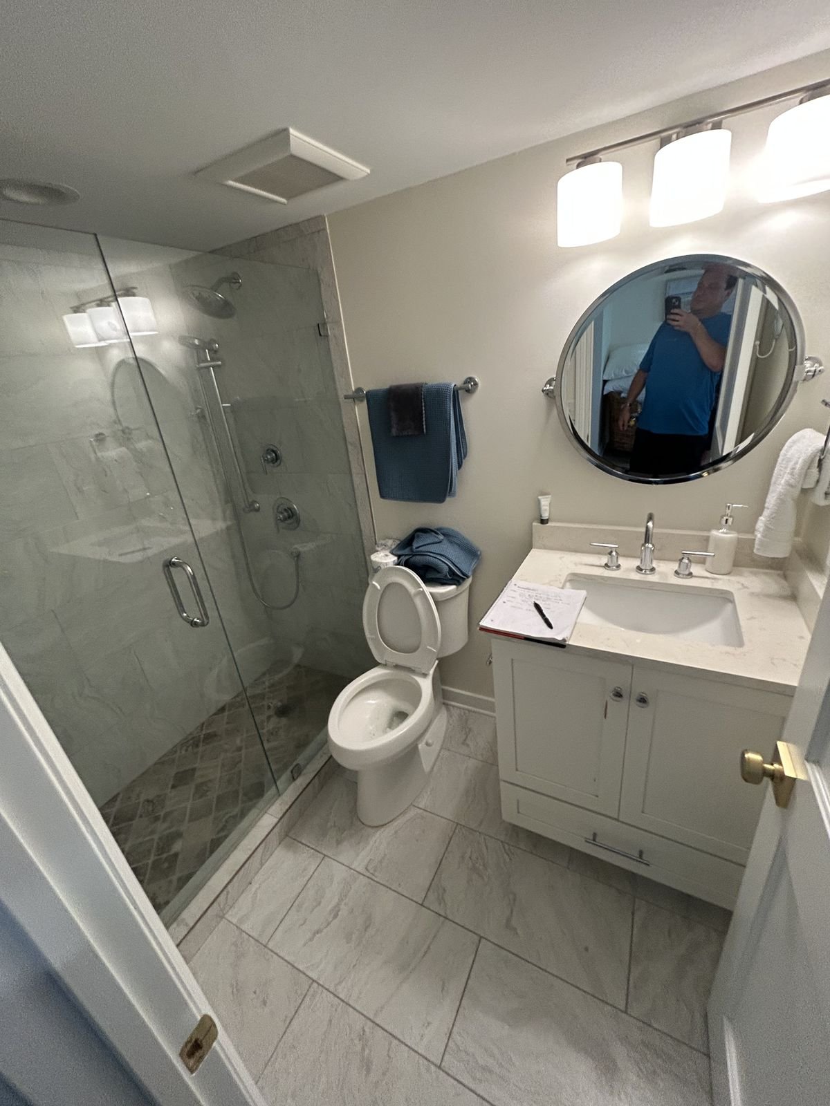 Bathroom remodel with glass shower, tile floor and vanity by Burson Construction, Bluffton SC