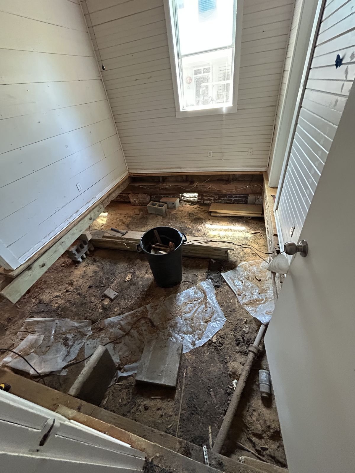 Floor taken up to the crawlspace for subfloor and framing repair by Burson Construction, Bluffton SC